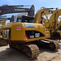2022 Caterpillar 312D excavator, rear three-quarter view