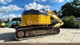 2004 Komatsu PC228USLC-3 crawler excavator, rear three-quarter view