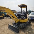 2023 Komatsu PC30 mini excavator, rear three-quarter view