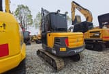 2021 Volvo EC60D mini excavator, rear three-quarter view
