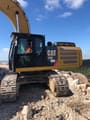 2014 Caterpillar 336E crawler excavator side view