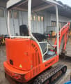 2001 Schaeff HR13 mini excavator, rear three-quarter view