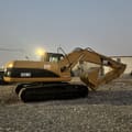 2022 Caterpillar 320C excavator, side profile view