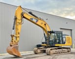 2012 Caterpillar 329E crawler excavator, side profile view