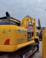 2024 Komatsu PC110 crawler excavator, rear three-quarter view