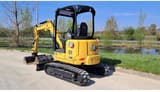 2023 Caterpillar 302.7 crawler excavator, rear three-quarter view