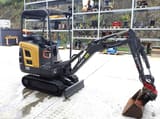 2015 Volvo EC15C mini excavator, side view