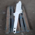 2026 Bobcat E19 Mini Excavator white boom arm, top-down view showing the full length of the arm.