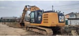 2014 Caterpillar 323E crawler excavator, rear three-quarter view