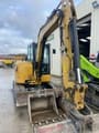 2022 Caterpillar 305E2 mini excavator, front three-quarter view