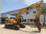 2015 Caterpillar 320BL crawler excavator, side profile view