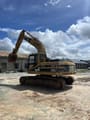 2020 Caterpillar 320B crawler excavator, rear three-quarter view