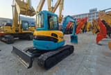 2019 Kubota KX155 mini excavator, front three-quarter view