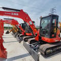 Kubota U55-4 mini excavator, front three-quarter view