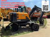 Hyundai HW60 wheel excavator, side view