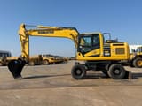 2019 Komatsu PW180-11 wheel excavator, side profile view