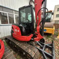 2023 Kubota U55-4 mini excavator, side profile view
