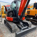 2023 Kubota KX165 mini excavator, rear three-quarter view