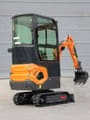 2025 Müller Machinery MB 12-KS H Mini Excavator, front three-quarter view, highlighting the undercarriage and tracks.