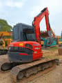 2024 Kubota U48-4 mini excavator, front three-quarter view