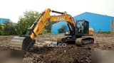 2026 CASE CX220C LC Crawler Excavator with its digging bucket positioned on a pile of dirt.