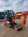2024 Kubota KX019-4 mini excavator, front three-quarter view