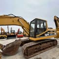 2000 Caterpillar 320B crawler excavator, side view