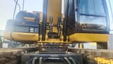 2019 Caterpillar 320C amphibious excavator, close-up of the upper structure and swing bearing