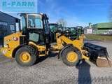 2021 Caterpillar 907M wheel loader, side view