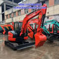 2024 Kubota KX155-5 Ai mini excavator, front three-quarter view