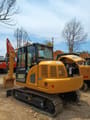 2023 Komatsu PC70 crawler excavator, rear three-quarter view