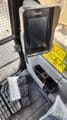 2025 JCB NXT 215LC Crawler Excavator interior showing the control monitor and foot pedals