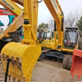 2025 Komatsu PC210LC-7 crawler excavator, front three-quarter view