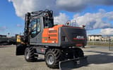 2017 Atlas 160W wheel excavator, rear three-quarter view
