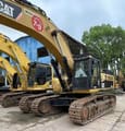 2010 Caterpillar 349D crawler excavator, side view