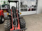 2023 Manitou MLA 3-25 mini excavator, front view