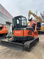 2024 Hitachi ZX50U mini excavator, rear three-quarter view