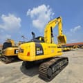 2023 Komatsu PC200-8 crawler excavator, rear three-quarter view