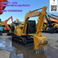 2021 Komatsu KX70 mini excavator, front three-quarter view