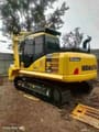 2022 Komatsu PC130-7 crawler excavator, rear three-quarter view