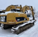 Escavatore cingolato Caterpillar 320D L del 2010, vista posteriore tre quarti