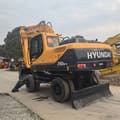 2024 Hyundai R210W-9T wheel excavator, rear three-quarter view
