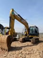 2023 Caterpillar 313D2 crawler excavator, front three-quarter view