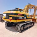 2024 Caterpillar 320BL crawler excavator, rear three-quarter view
