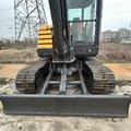 2023 Volvo EC60C mini excavator front view with blade