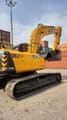 2025 JCB NXT 215LC Crawler Excavator with its bucket raised and ready for operation
