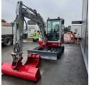 2021 Takeuchi TB240 crawler excavator, front three-quarter view