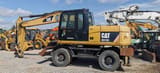 2011 Caterpillar M315D wheel excavator, side profile view