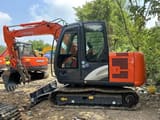 2024 Hitachi ZX60 mini excavator, side view