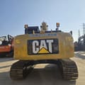 2022 Caterpillar 323DL crawler excavator, rear view